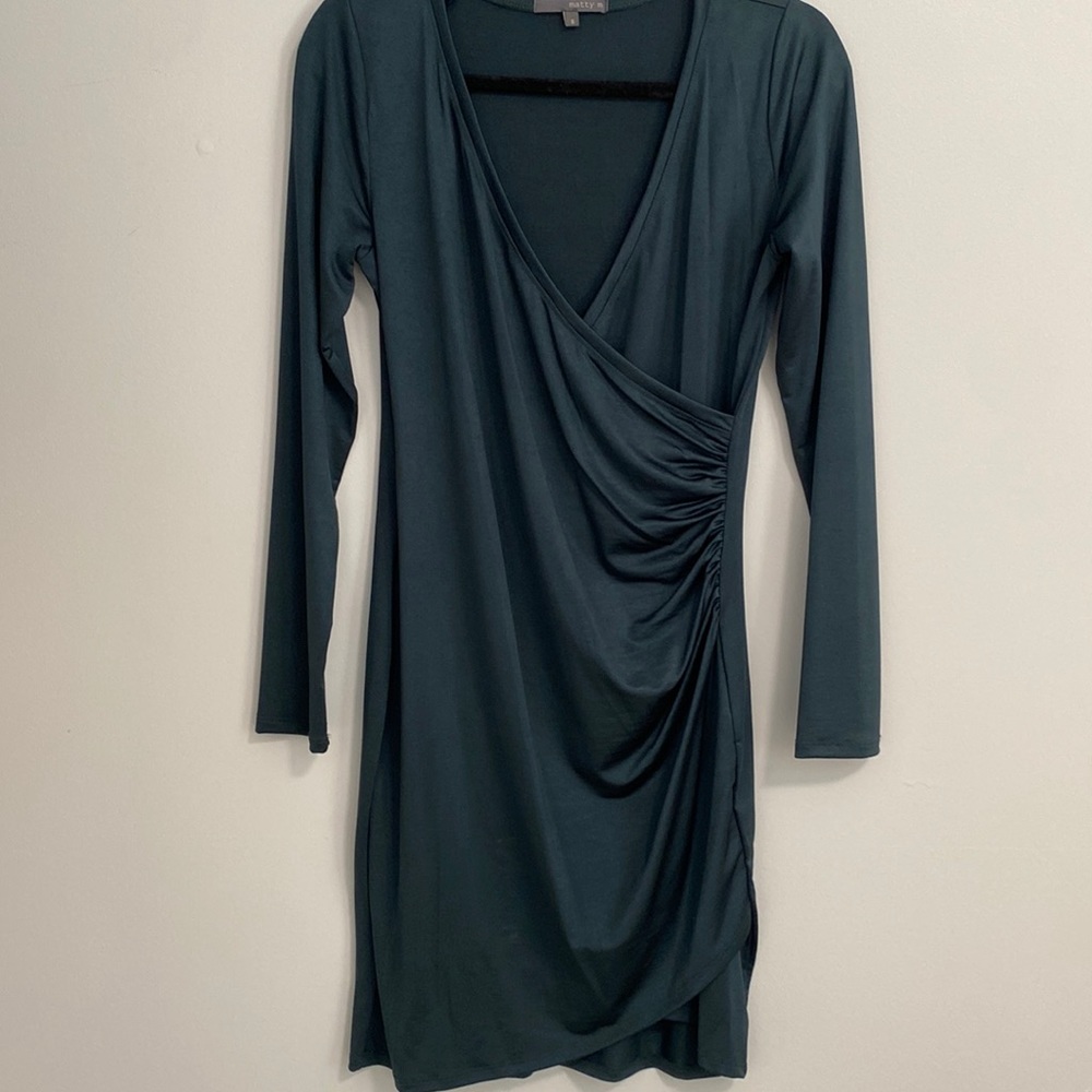 Brand new dress,never worn. Size Small cute for winter time.